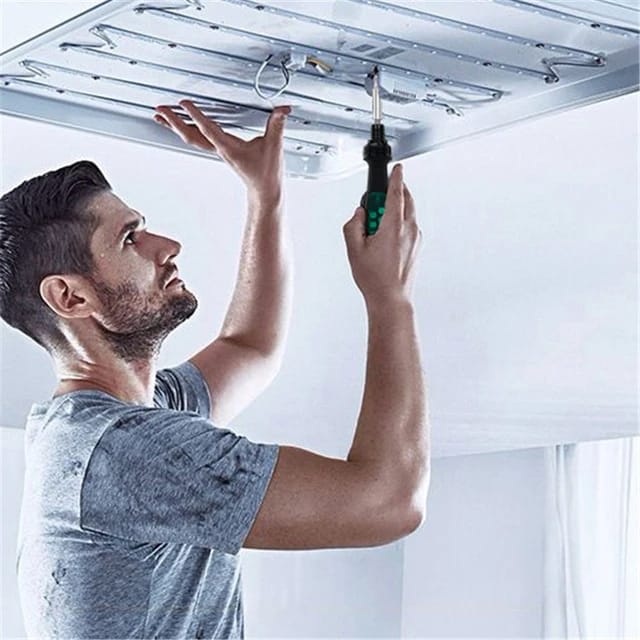 Someone doing a job with the help of the 10-in-1 Ratchet Screwdriver