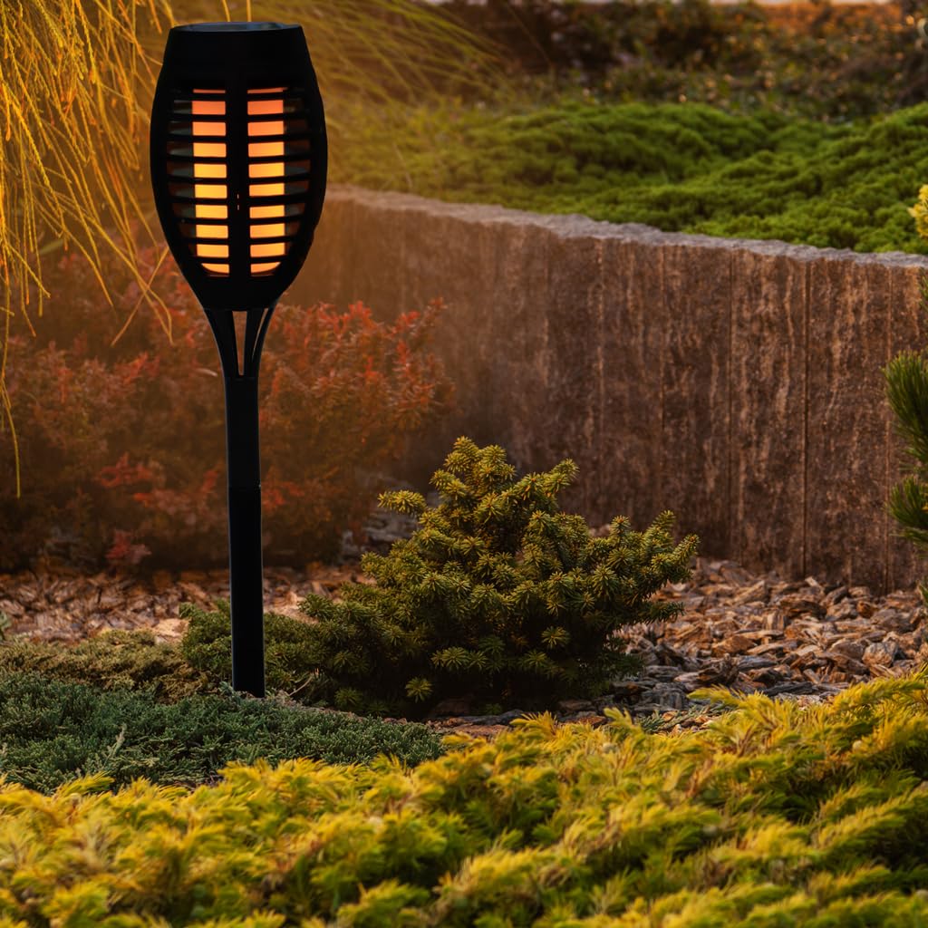 12-LED Solar Torch Light is Placed at Garden Area.