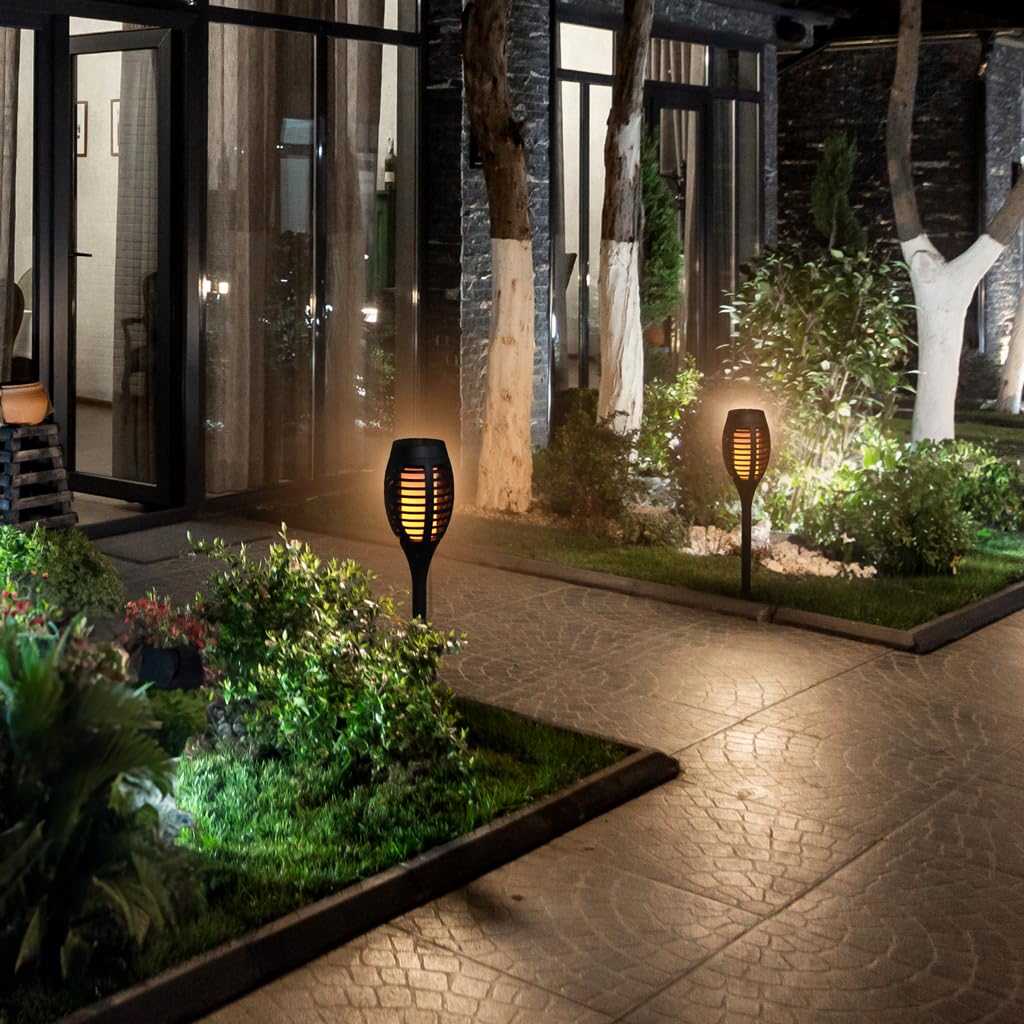 12-LED Solar Torch Light Placed at Garden Area.