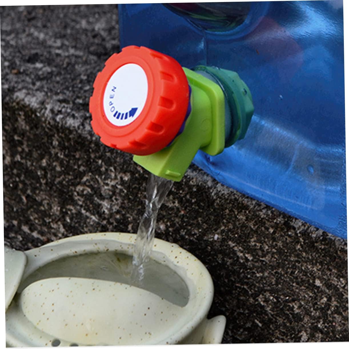 Pouring water from a 25L Portable Water Dispenser Container for the refrigerator into a pot