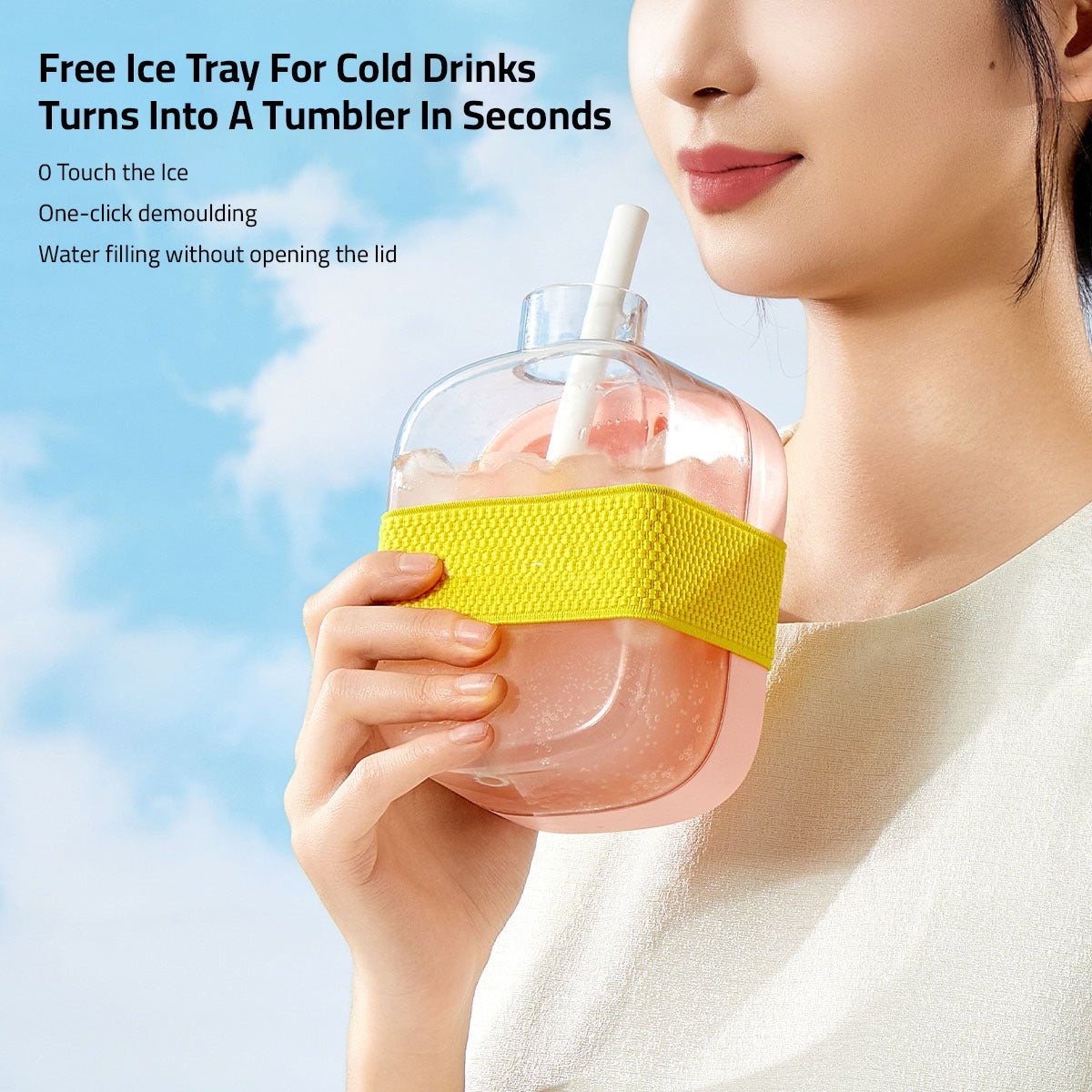 A Woman is Drinking From 2 in 1 Ice Cube Maker Water Bottle.