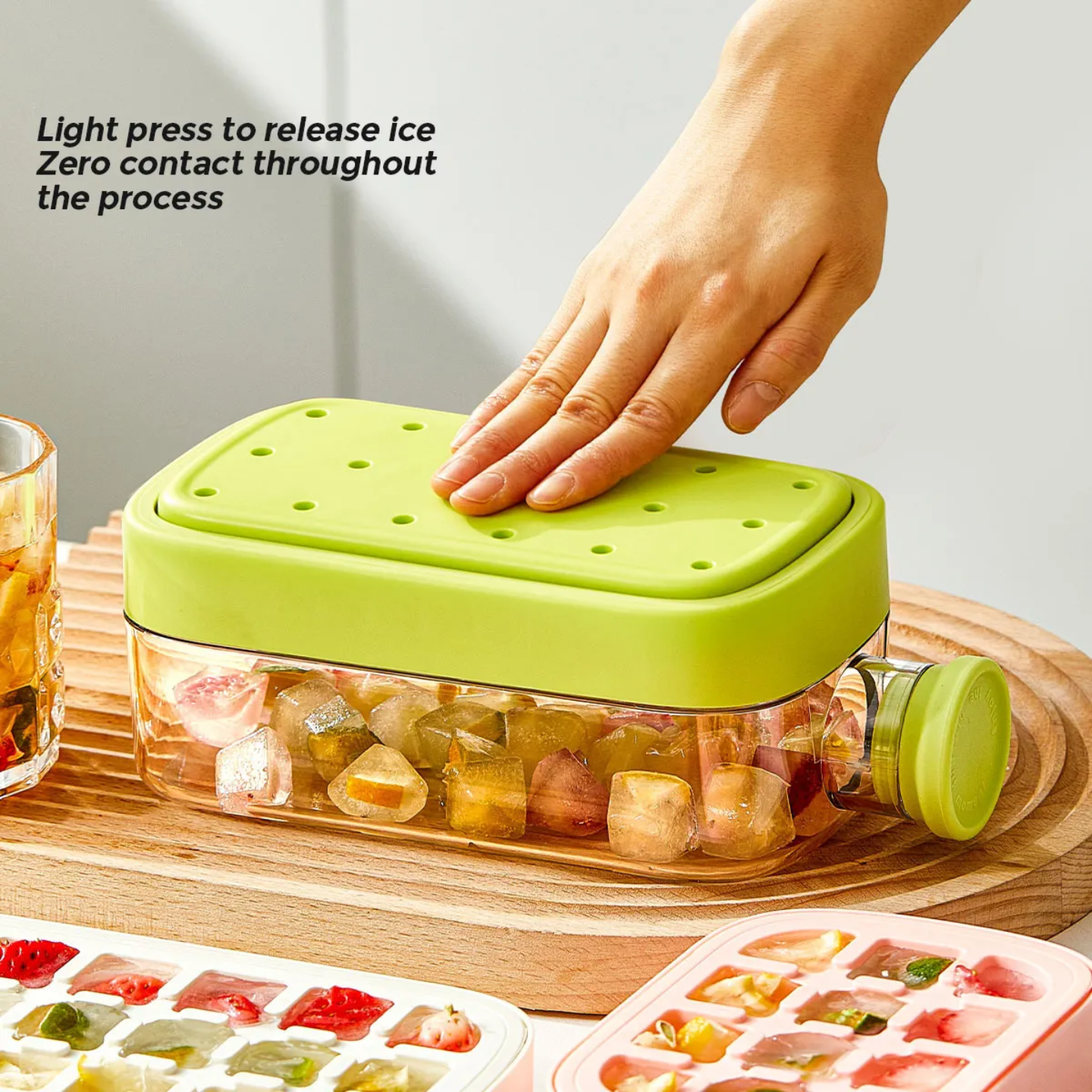 A Person is Pressing 2 in 1 Ice Cube Maker Water Bottle.