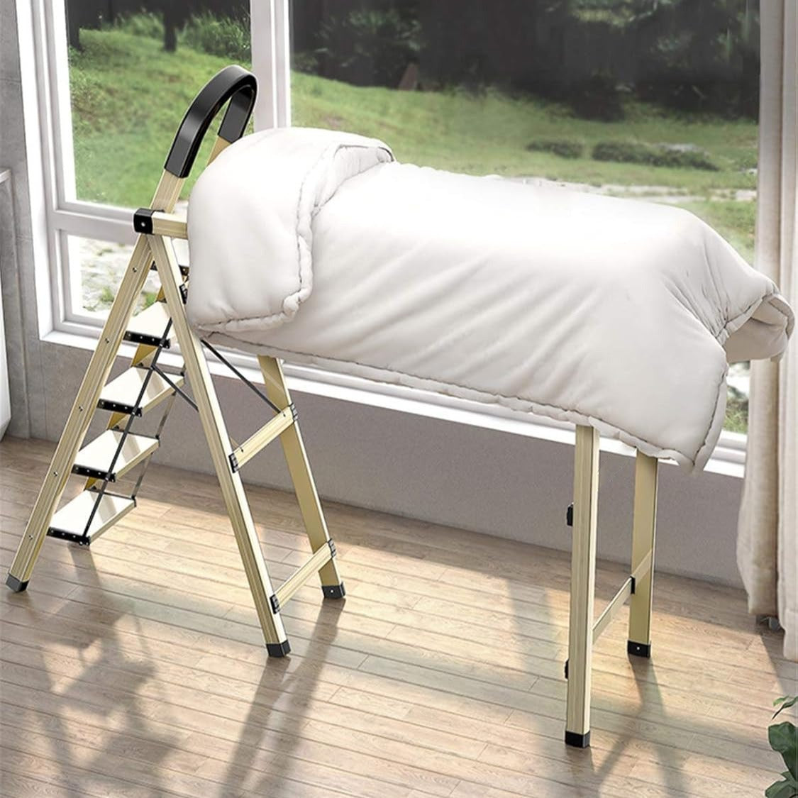 2 in 1 Ladder Cloth Drying Rack with Blacket is Kept On it.