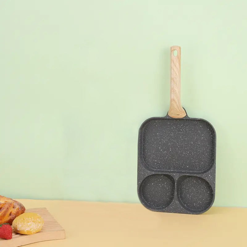 2 in 1 egg pan placed on kitchen wall