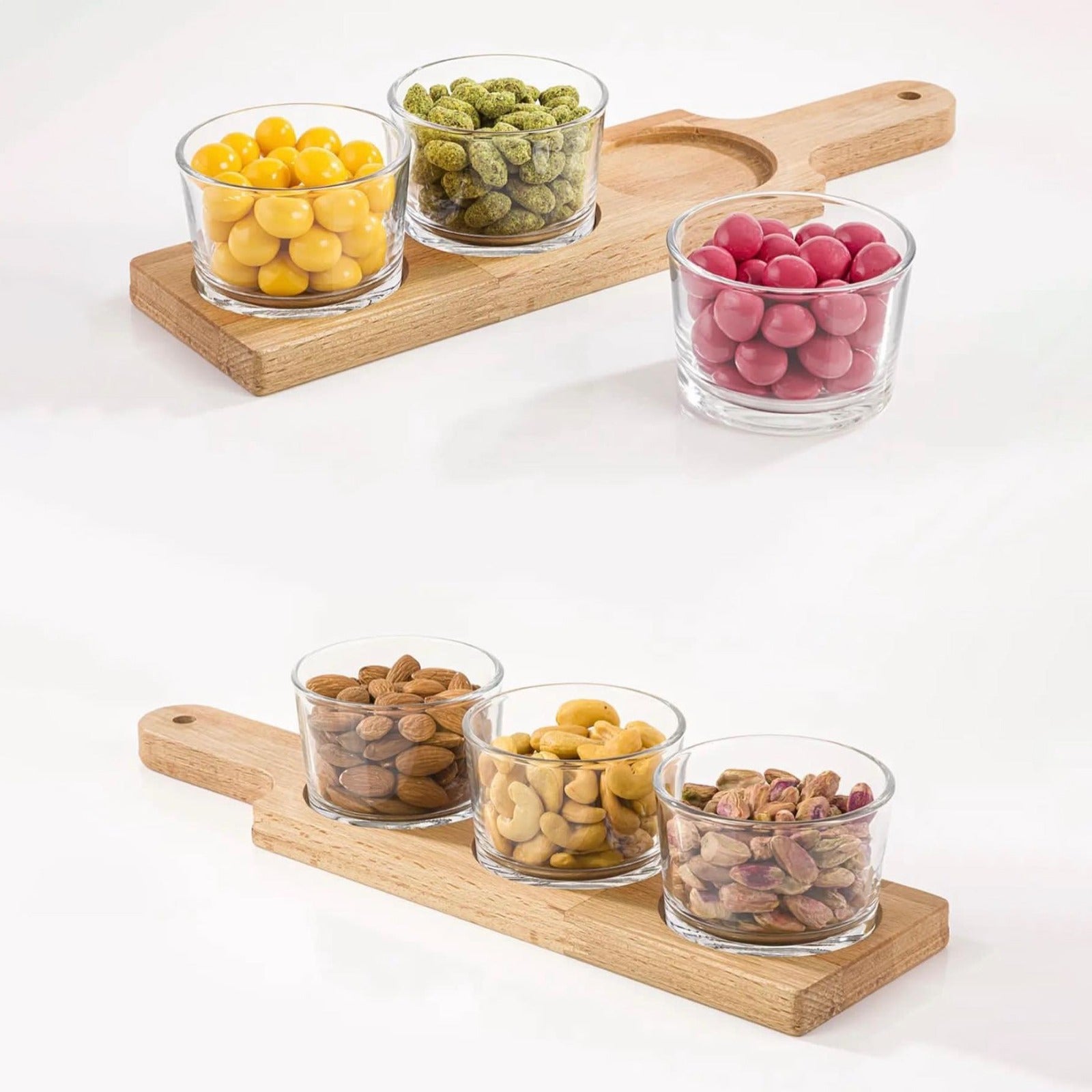 A 3 Section Snack Bowl Serving Tray with Wooden Base Filled with Nuts and Dried Fruits.