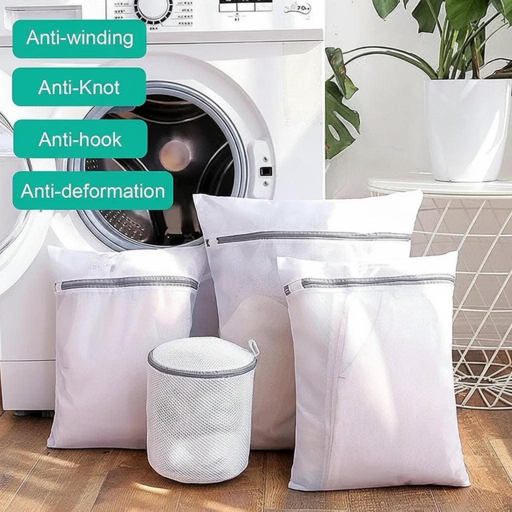 4 Pcs Mesh Laundry Washing Bags Set in front of a washing machine.