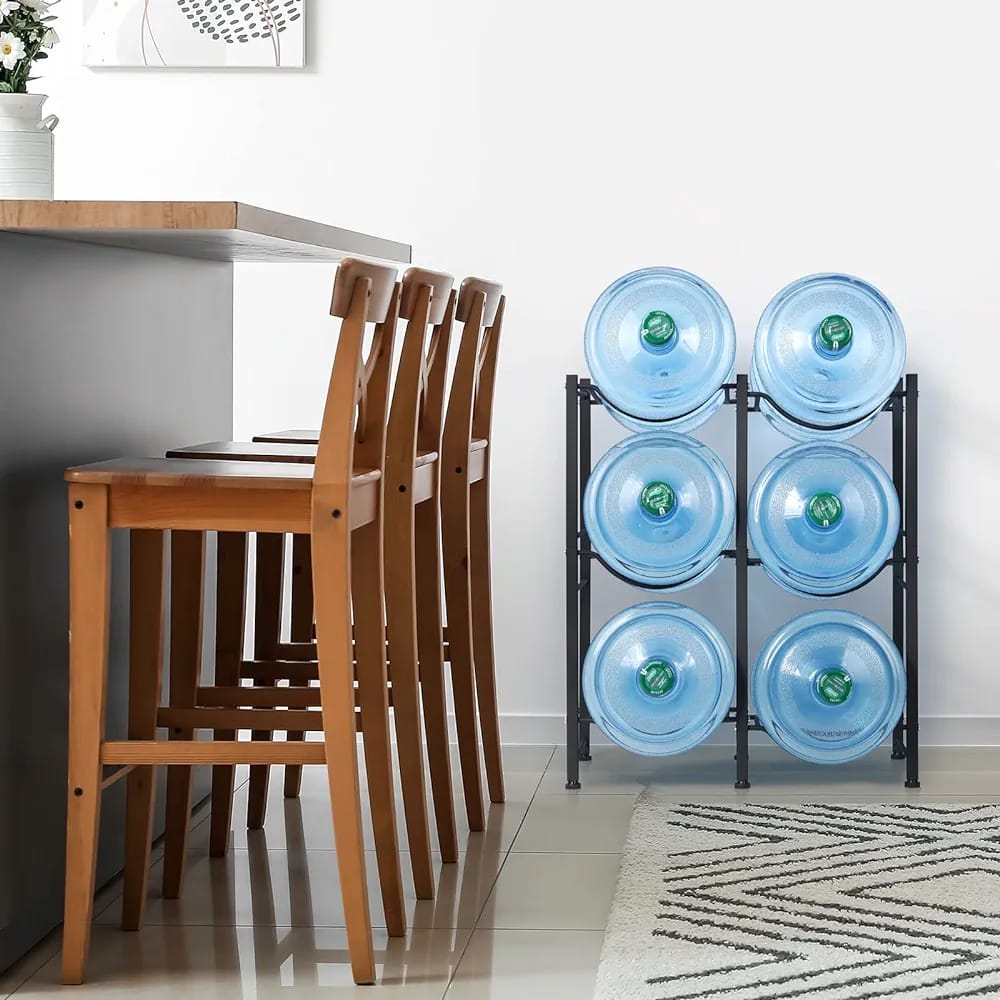 5 Gallon Water Bottle Stand placed in the room with some bottles