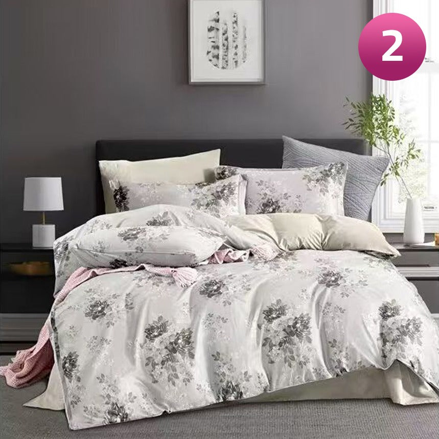 6-piece bedding set with floral comforter, fitted sheet, and pillow covers on a king bed.