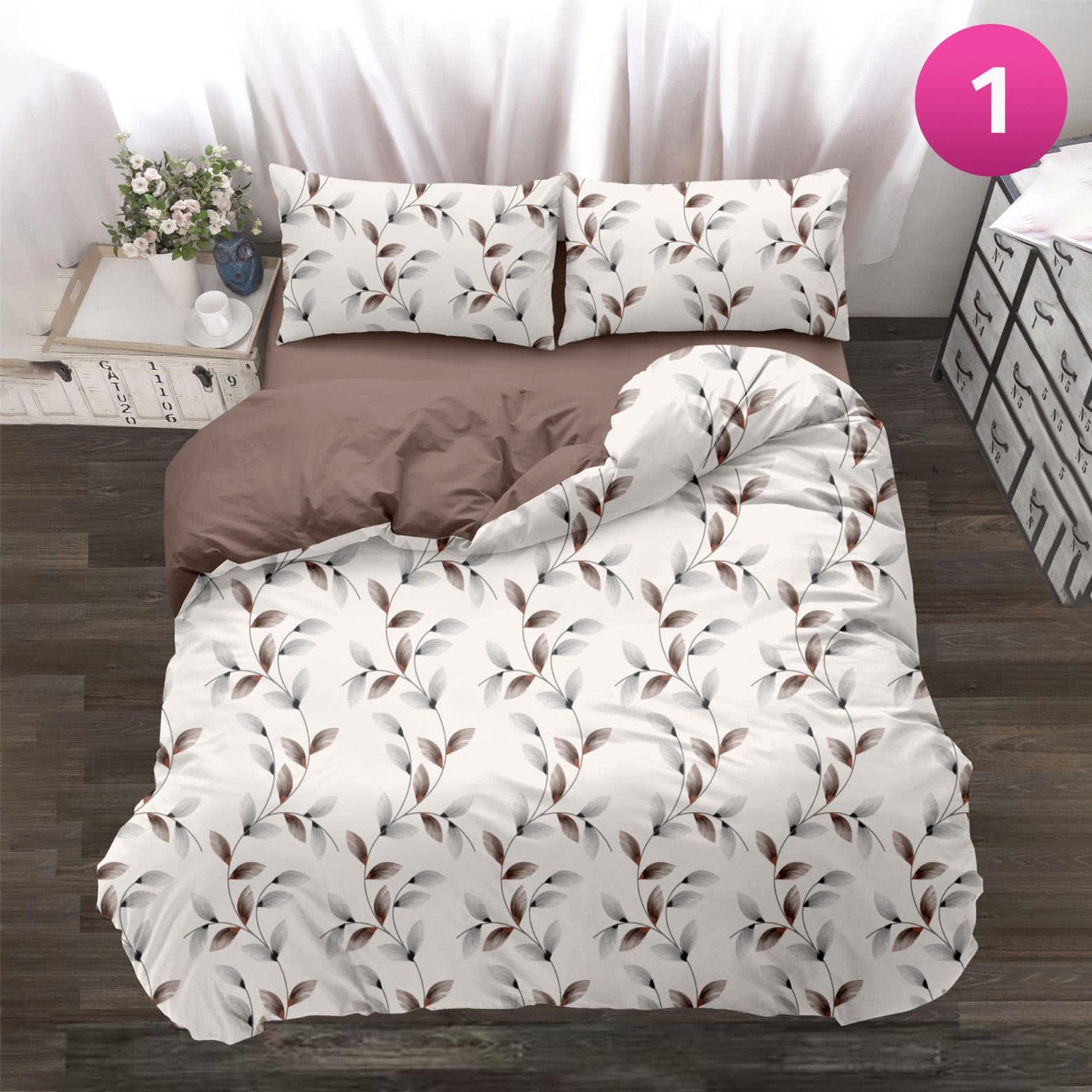 6-piece bedding set with floral comforter, fitted sheet, and pillow covers on a king bed.