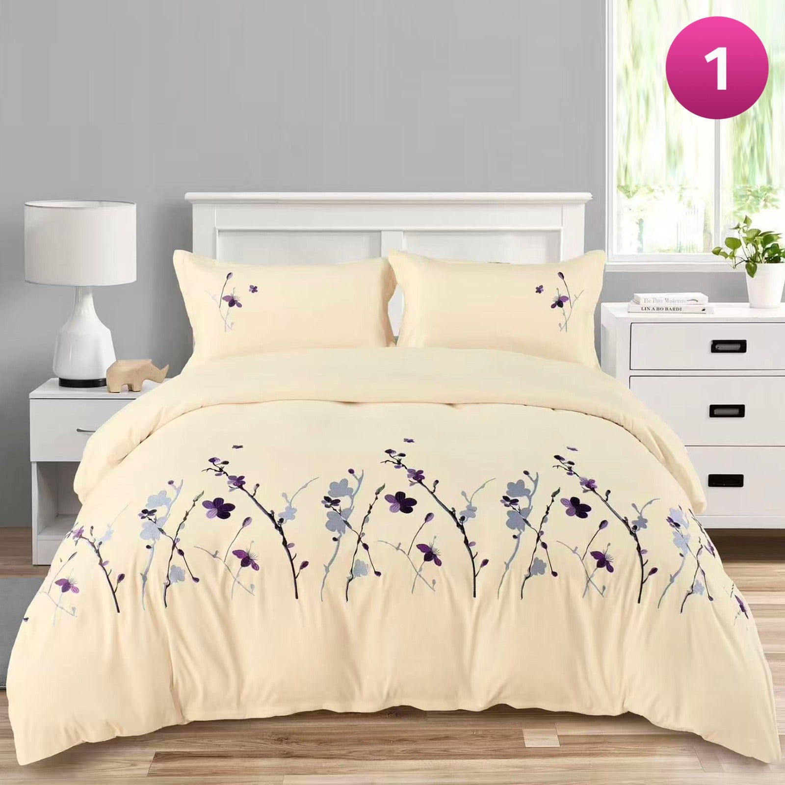 6-piece bedding set with floral comforter, fitted sheet, and pillow covers on a king bed.