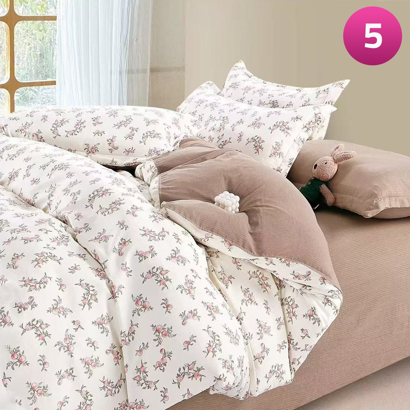 6-piece bedding set with floral comforter, fitted sheet, and pillow covers on a king bed.