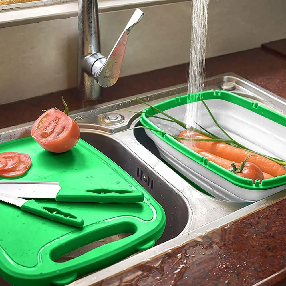 A 9-in-1 Multifunction Cutting Board with Vegetables are Placed at Wash Basin and Water is Pouring on it.