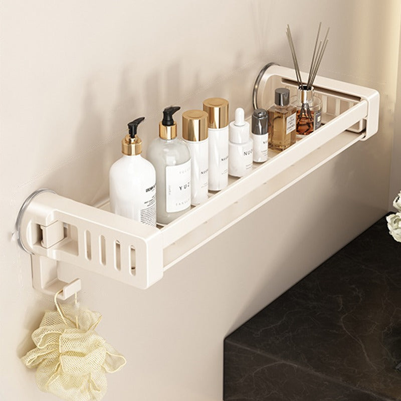 A Bathroom shelf rack is Attached to the Wall Of Bathroom Area Organized with Shower Items.