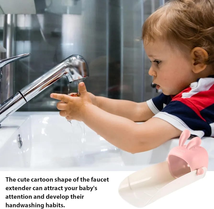 A Baby is Washing Hands On a Tap Connected With Faucet Extender for Toddlers.