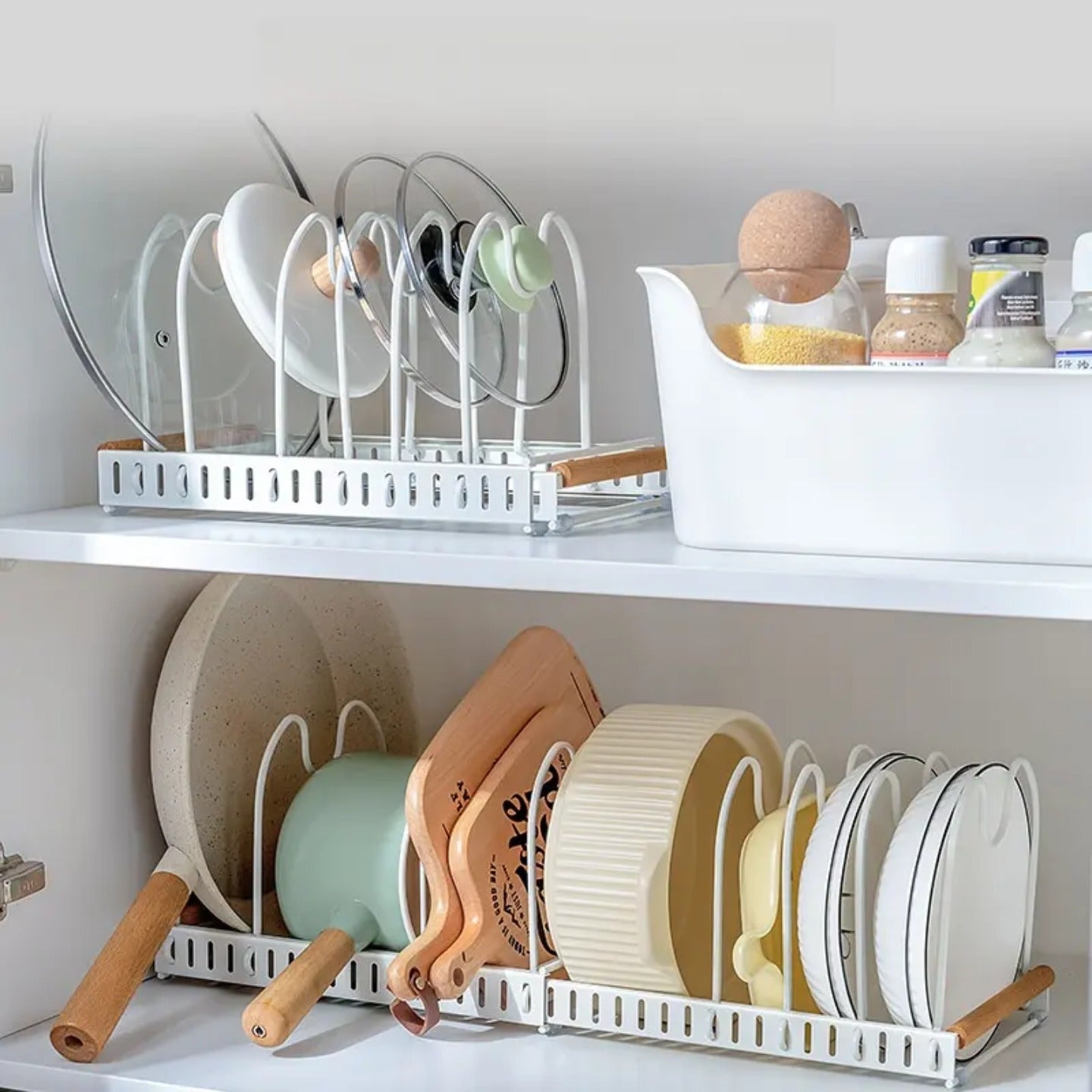 Expandable Pot and Pan Organizer Rack Organized with Pans and Plates.