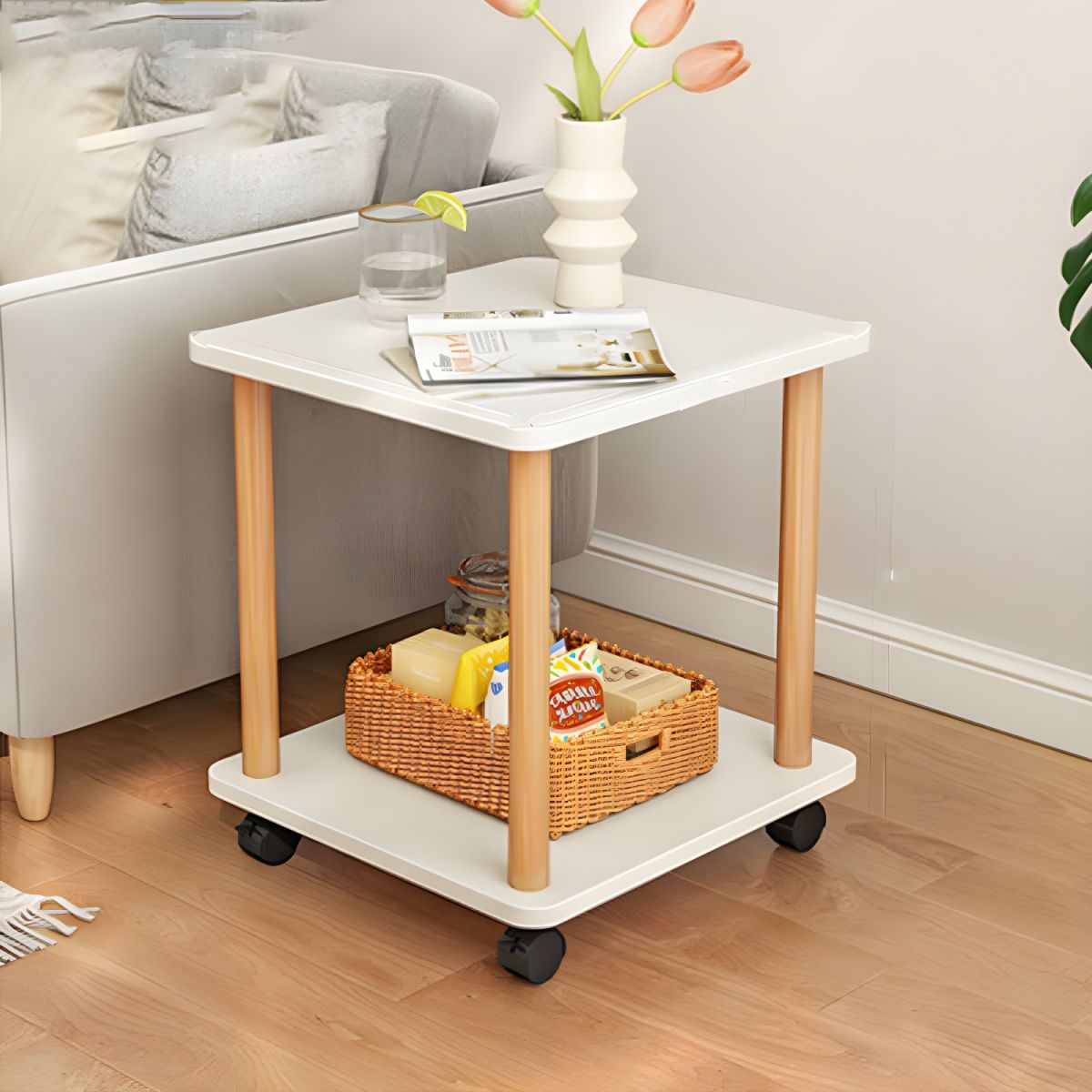A Rolling Side Table with Storage Shelf is Kept on the Side Of Sofa.