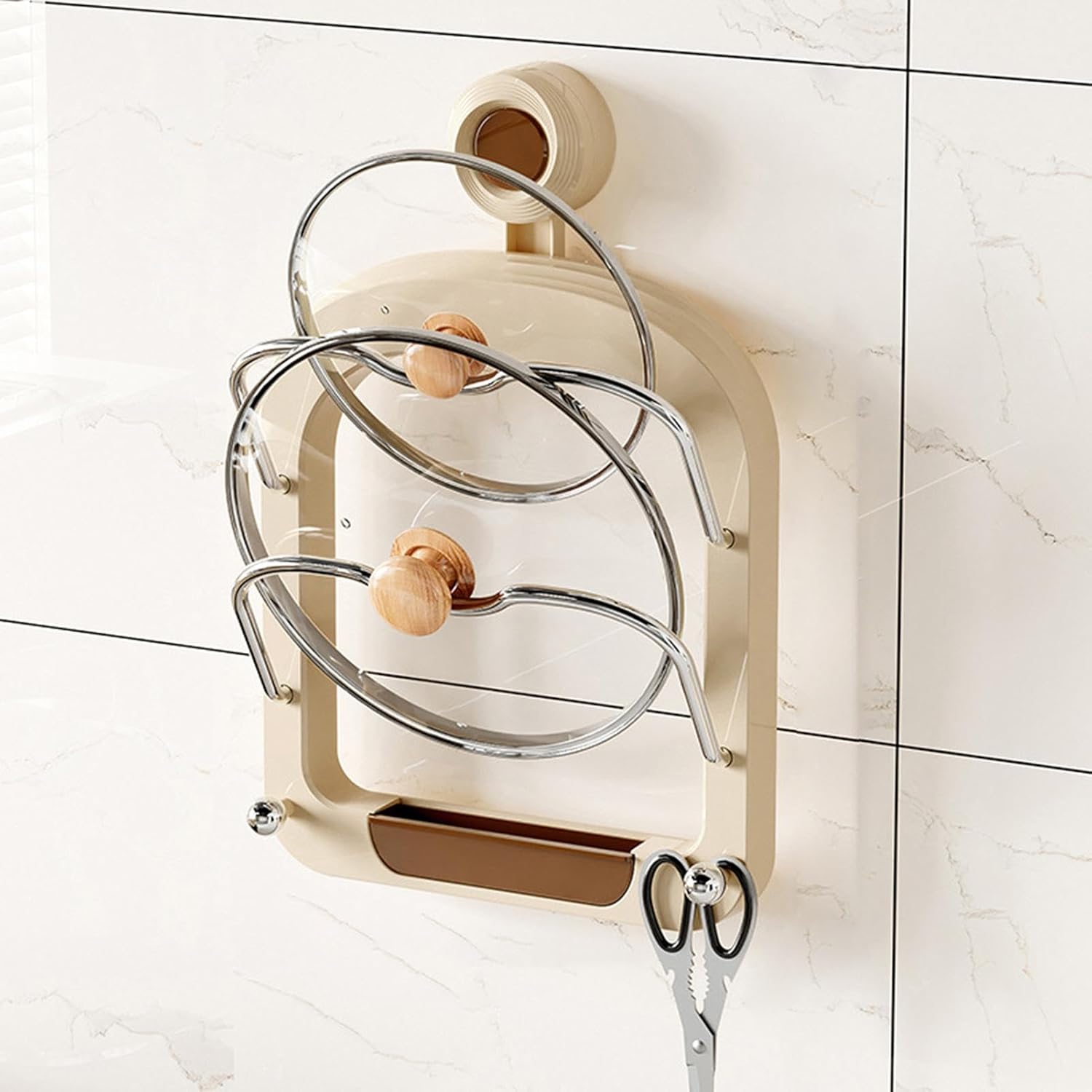 A Suction Cup Pot Lid Holder With Lids Attached on the Wall.