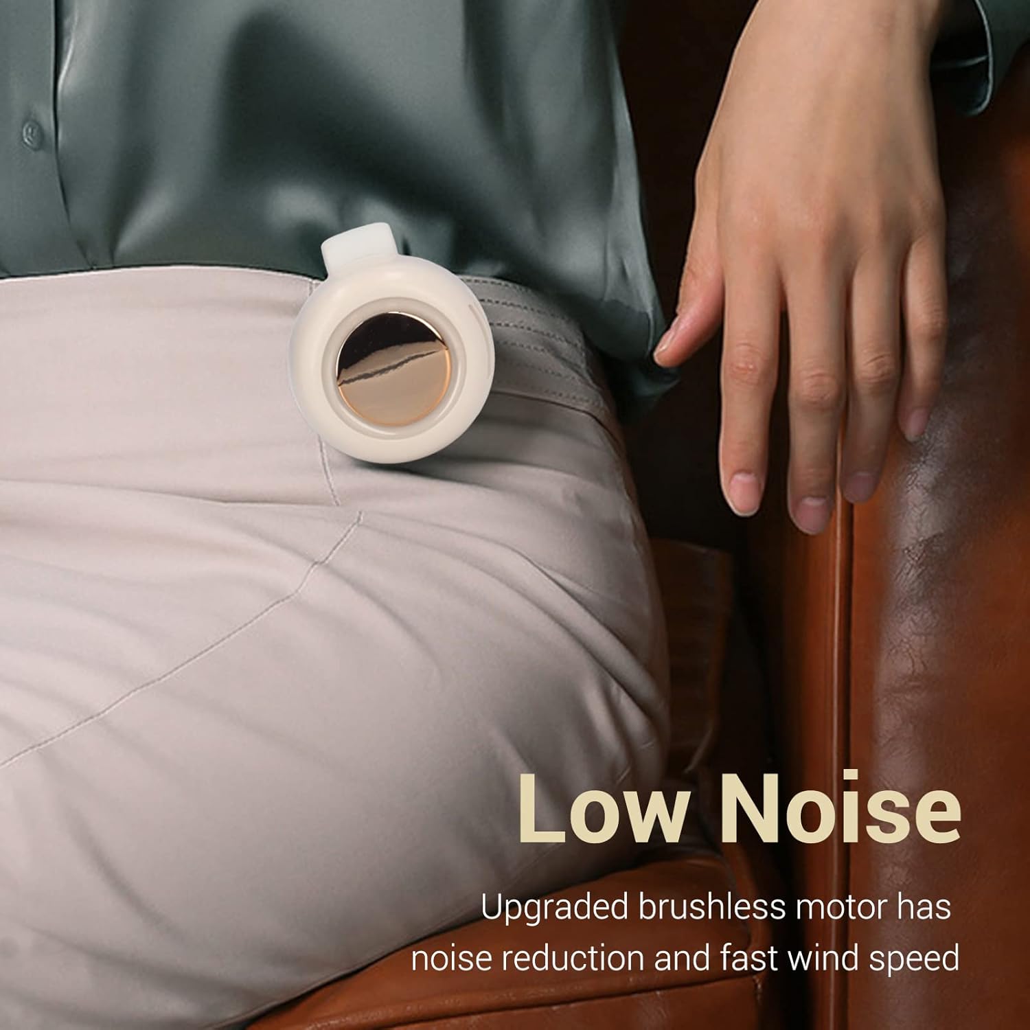 A Woman is Attached Pocket Clip Fan on her Waist Area.