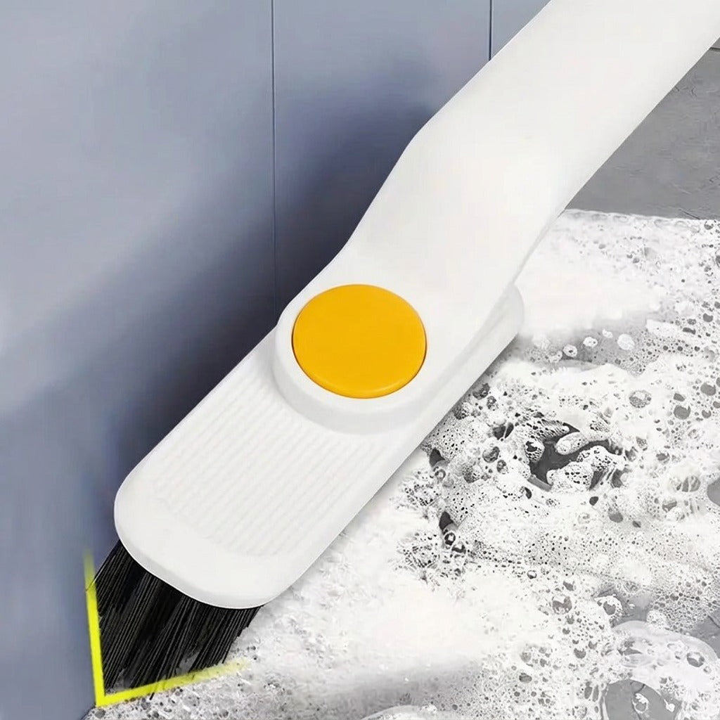 A multi-function rotating cleaning brush with an adjustable head is scrubbing tiles.