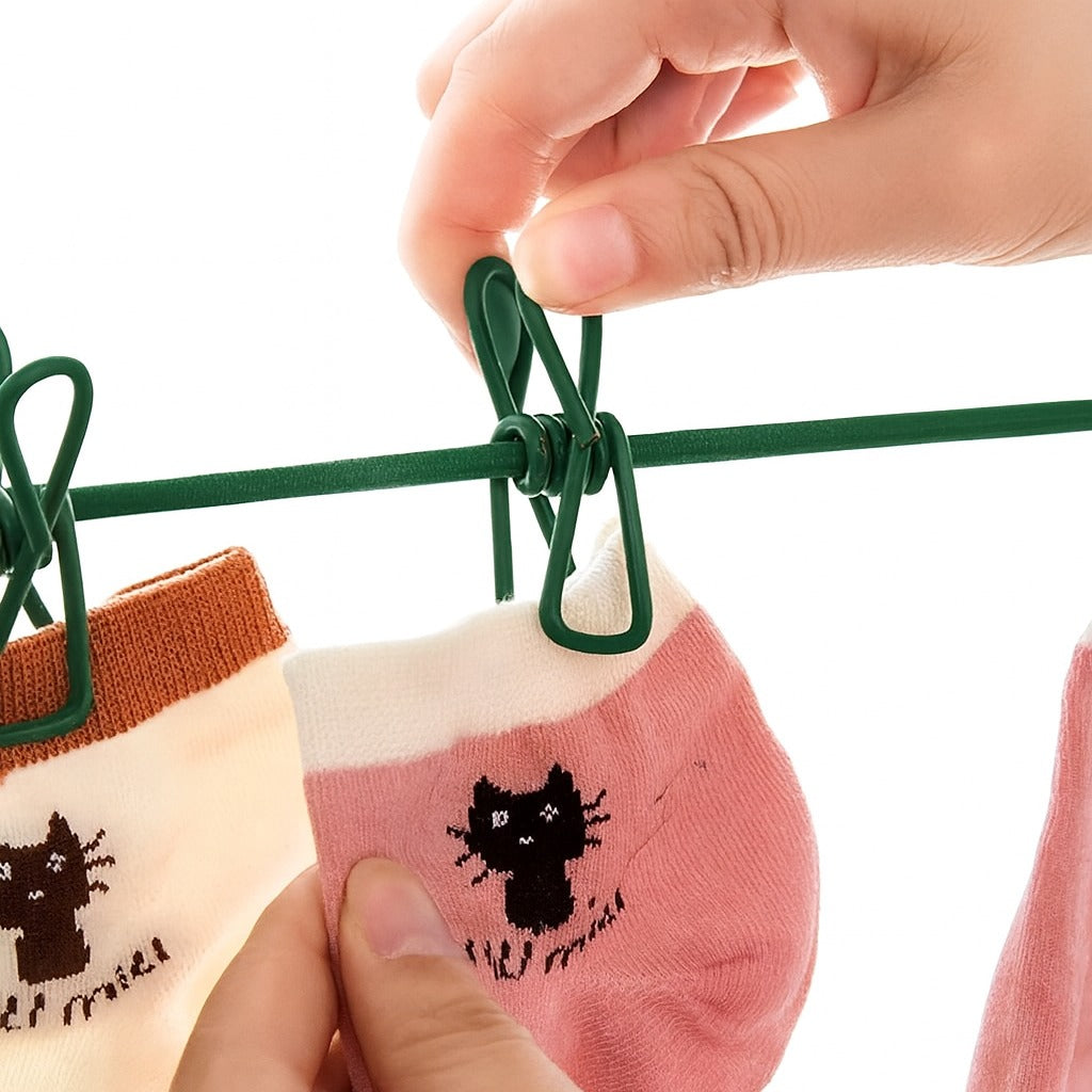 A Person is Hanging Socks on Adjustable Clothes Drying Rope.