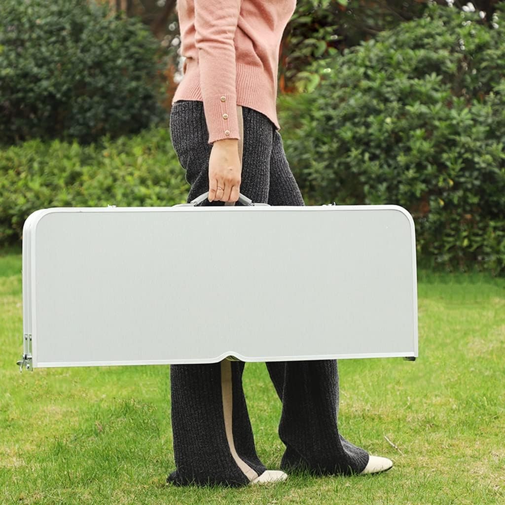A Woman is Carrying Aluminum Picnic Table.