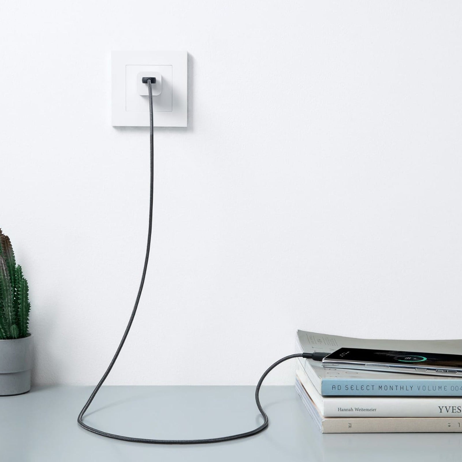 nker 322 USB-A to USB-C Cable (3ft Braided) plugged into a mobile device