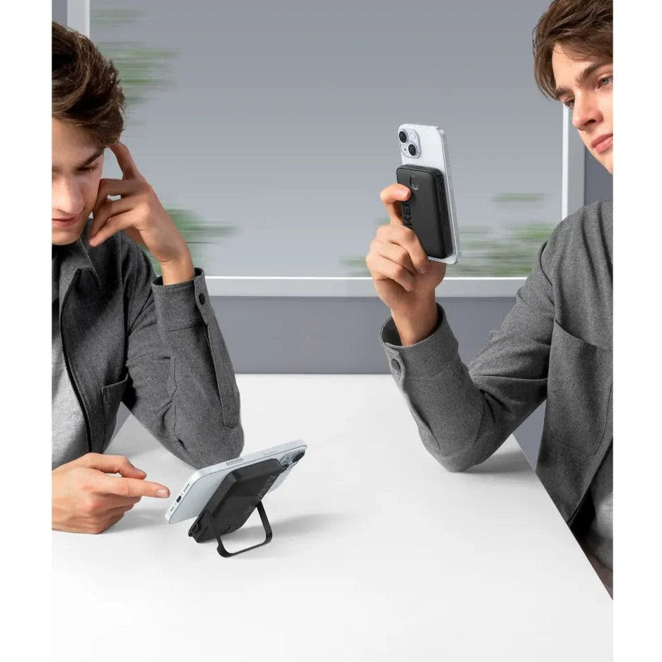 Two People are Using Anker MagGo 322 Power Bank.