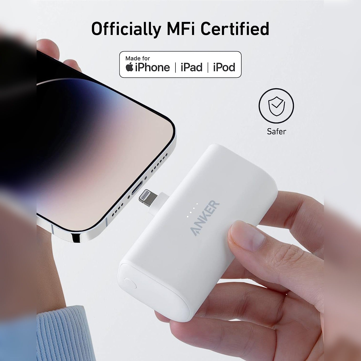 Someone is trying to plug in their mobile phone using the Anker Nano Power Bank