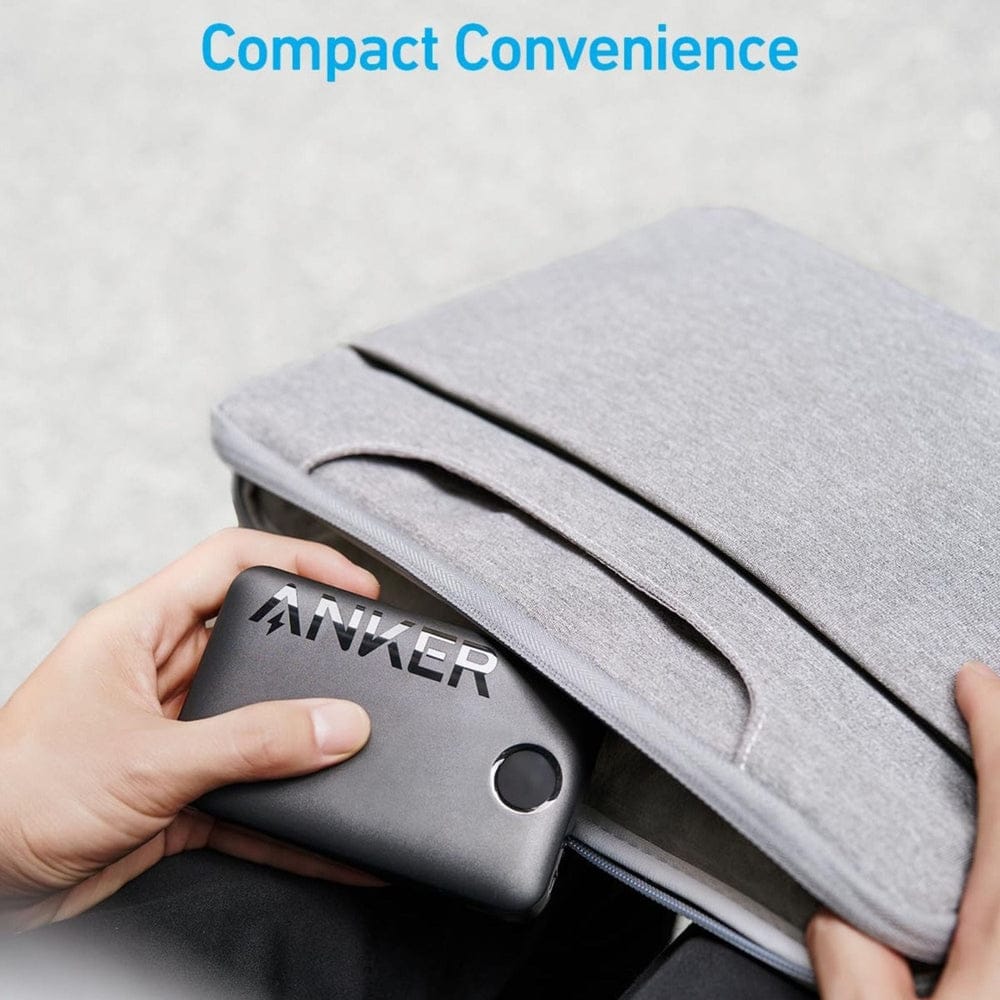 A Person is Placing Anker Ultra Compact Power Bank (20,000 mAh, 22.5W, Built- In -USB- C Cable) - A1647H11 in to Bag.