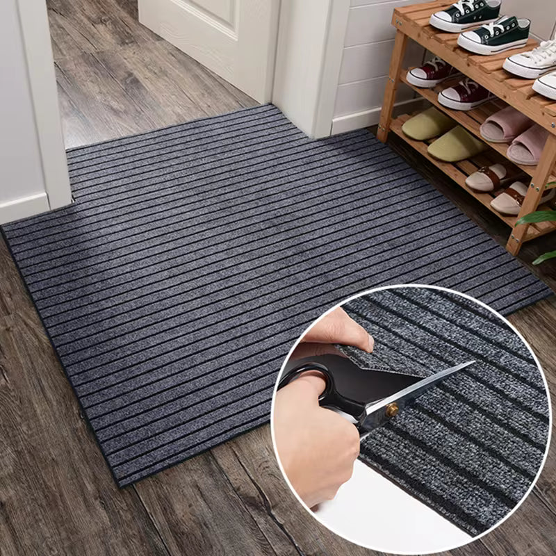 A Person is Cutting an Anti-Slip Door Floor Mat.