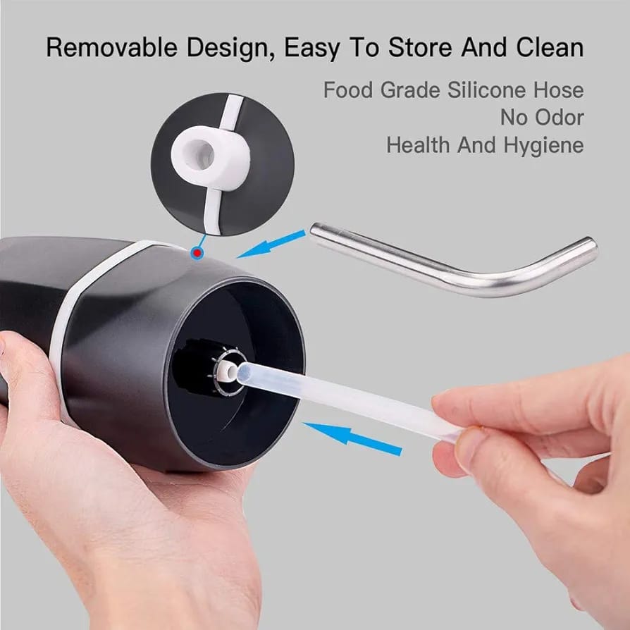 A Person is Fixing the Hose Of Automatic Wireless Water Dispenser Pump.