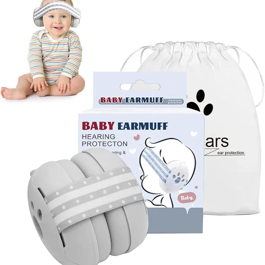 A Baby is Wearing Baby Ear Muffs and Package is Placed Nearby.