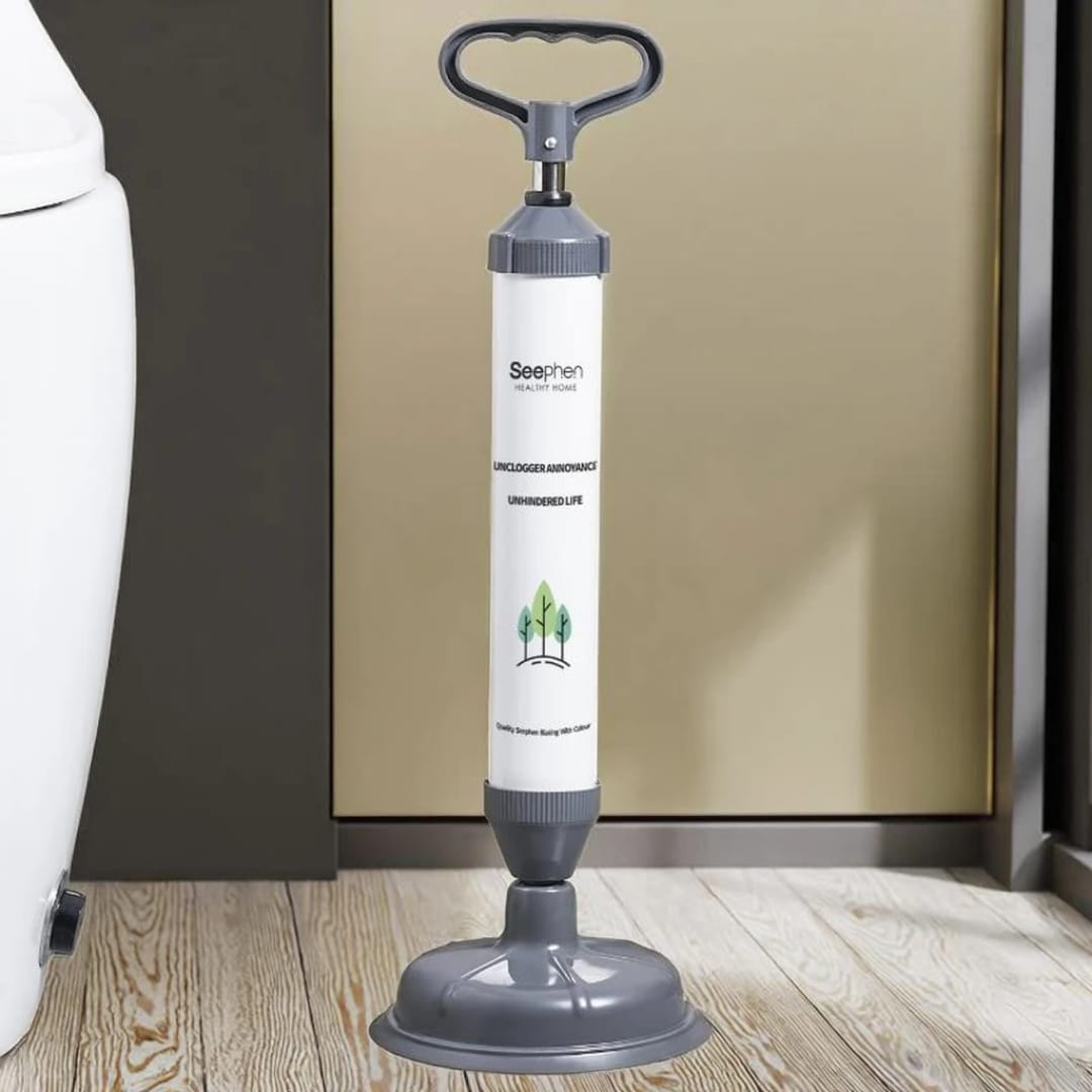 Vacuum Type Multi-Purpose Pipeline Unclogger Placed at Bathroom.