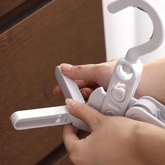 some holding Portable Foldable Clothes Hanger