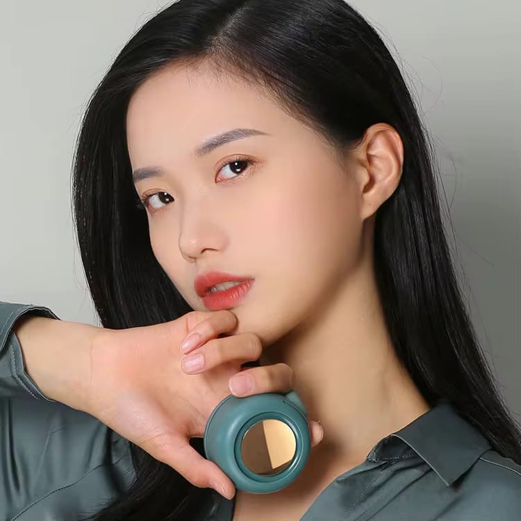 A Woman is Holding Bladesless Fan.