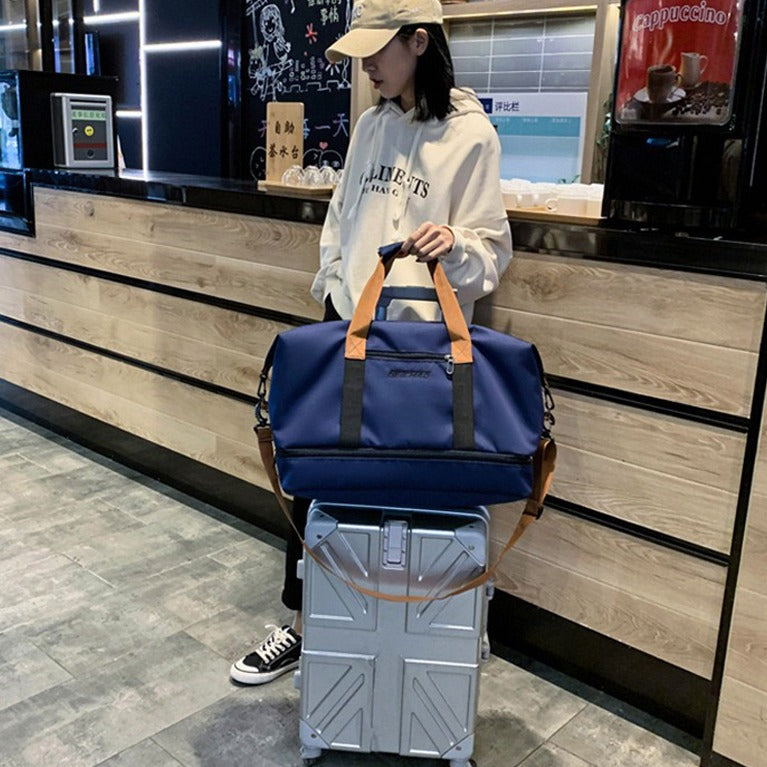 A Girl is Carrying Multi-functional Fashion Fitness Travel Duffle Bag.