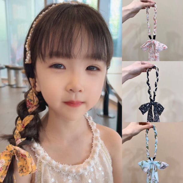 Cute Girl Wearing Braided Hairband.