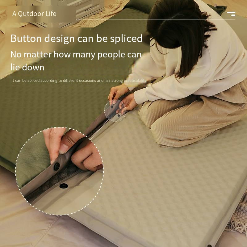 A Woman is attaching another mattress with Self-Inflating Camping Mattress.
