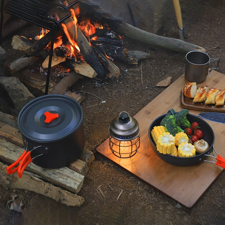 Camping Outdoor Cookware Set is Used For Cooking in a Camping Area.