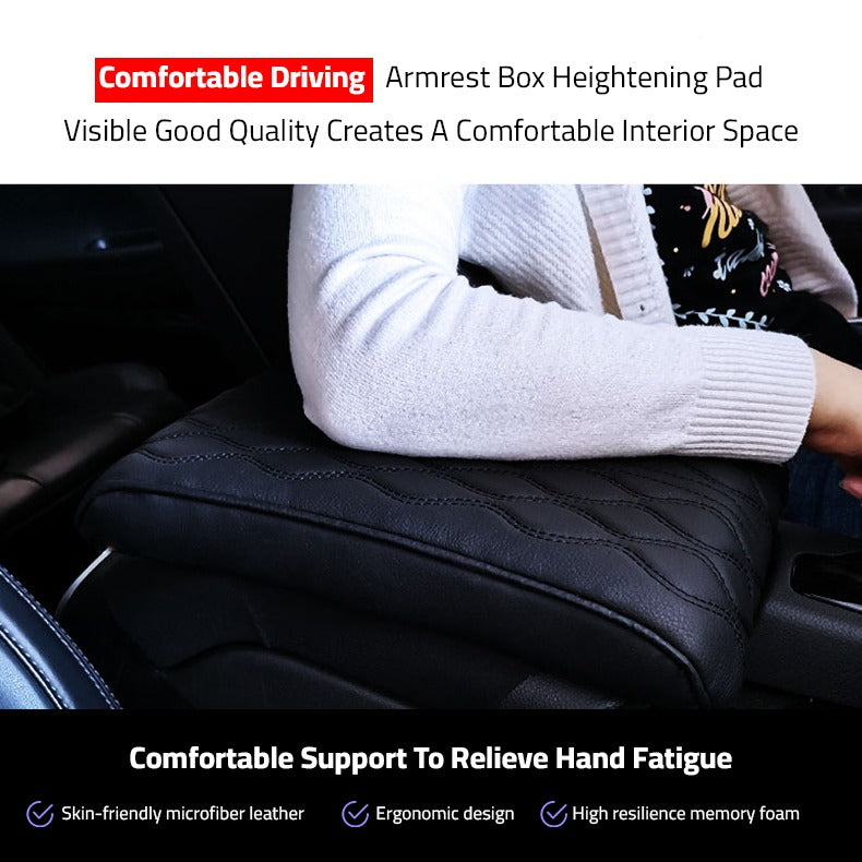 A Person is Placing his Elbow at Car Armrest Cushion Which is Placed on a Center Console of a Car.