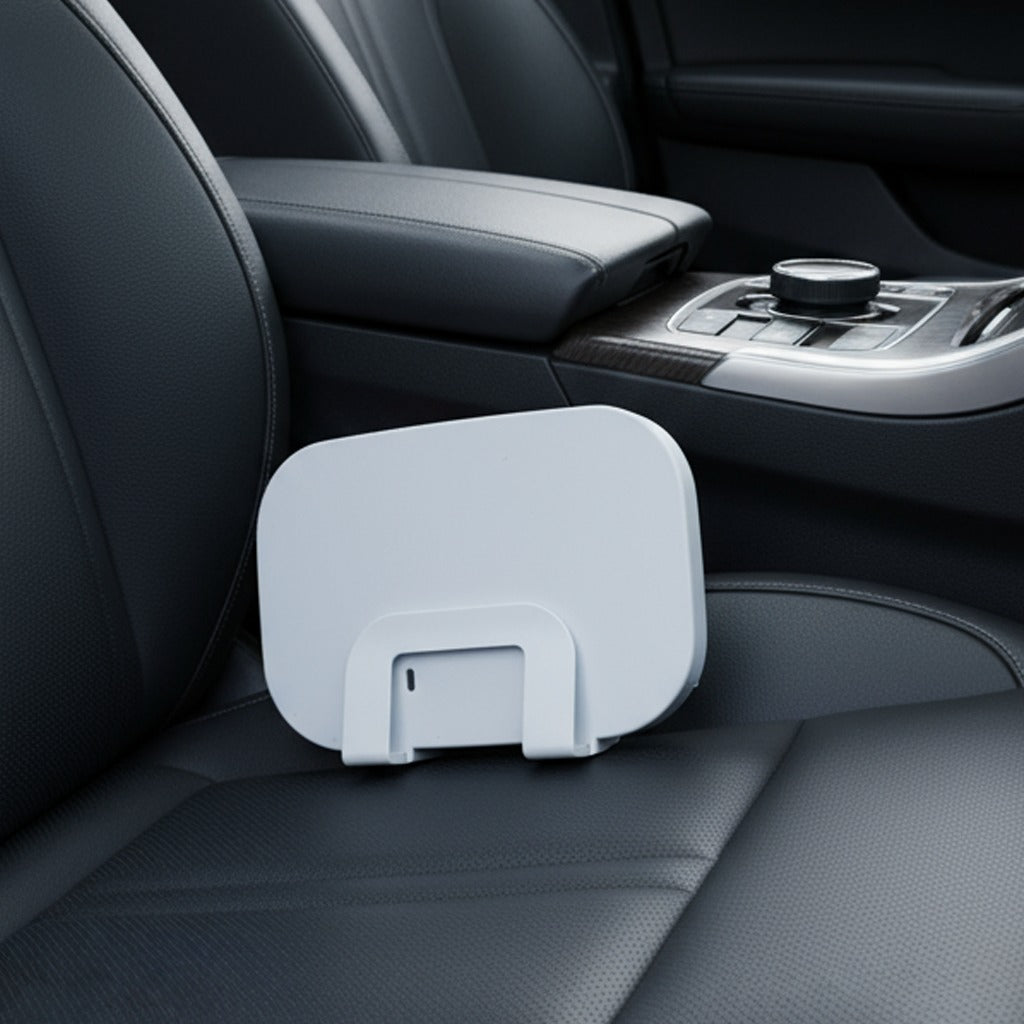 A Car sun visor vanity mirror is Placed in a Car Seat.