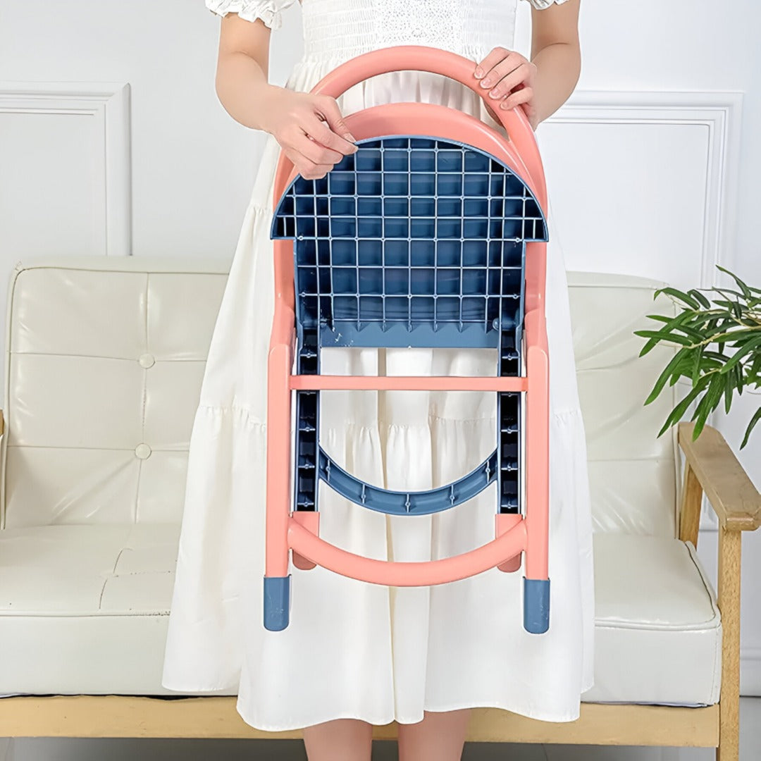 A Person is Holding Child Folding Chair.