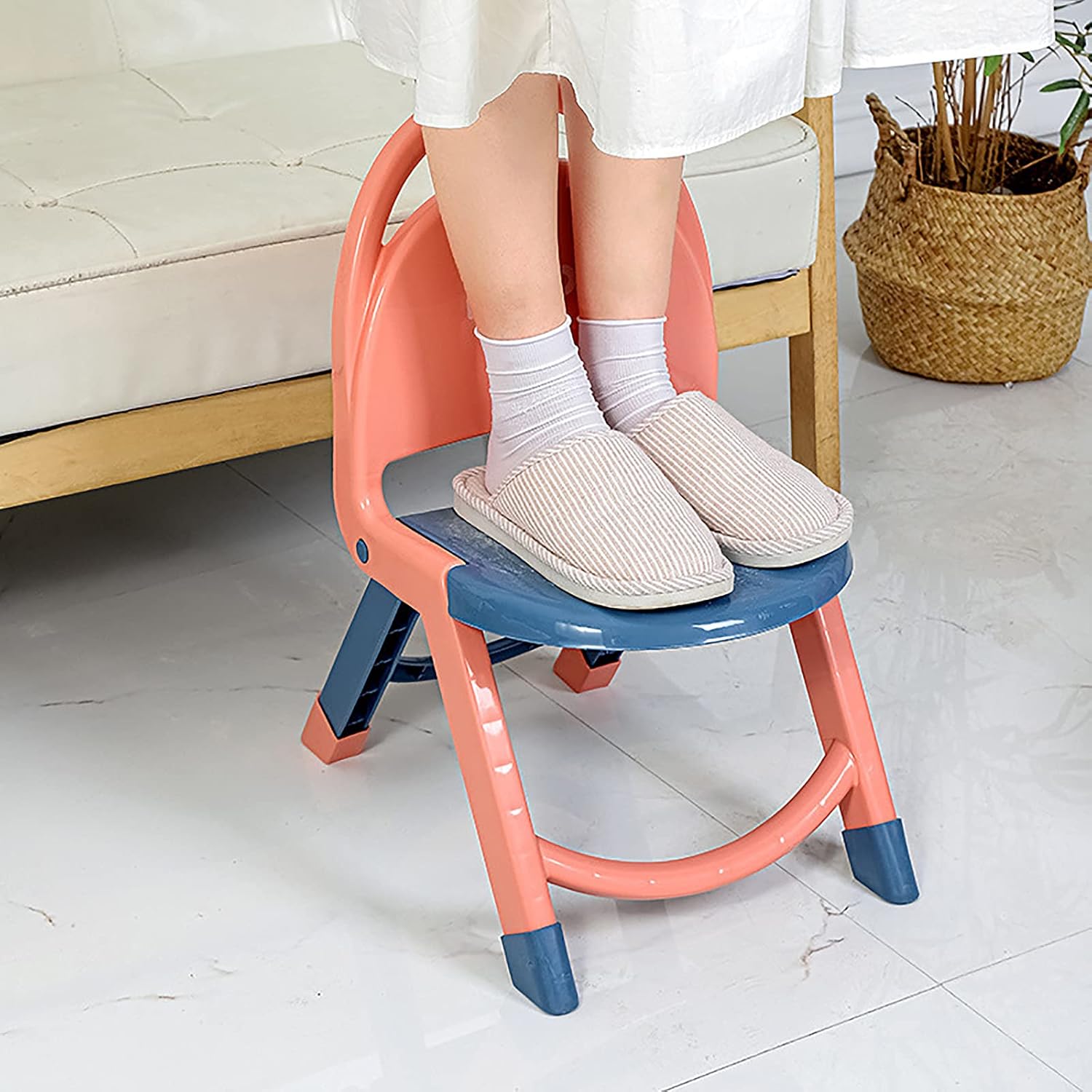 A Person is Standing On the Child Folding Chair.