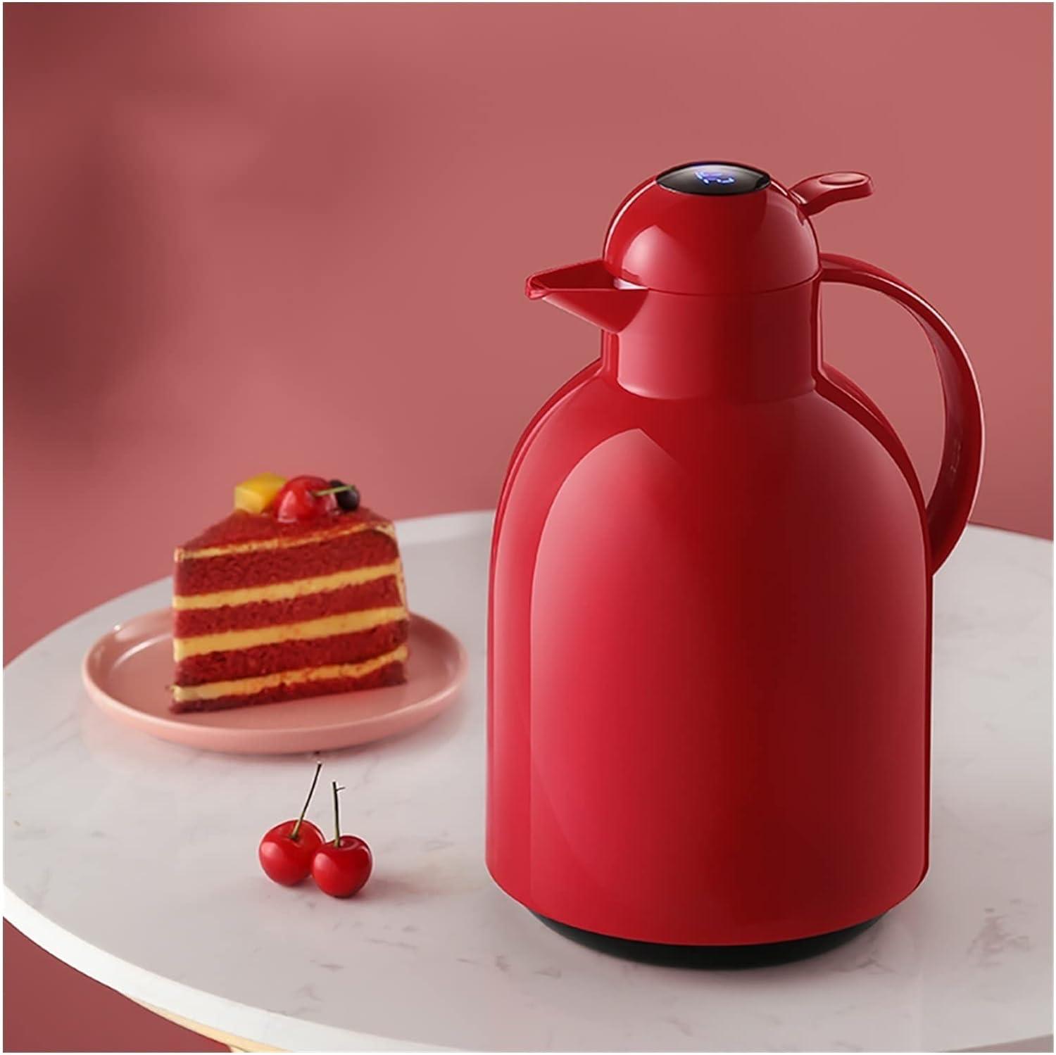 LED Temperature Display Vacuum Insulated Flask elegantly placed on the plate next to cherries