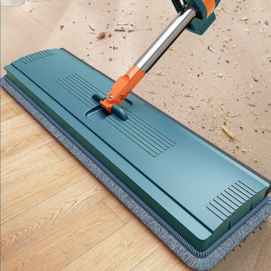 Cleaning Floor Using Self Squeezing Micro Fiber Flat Mop With Bucket.