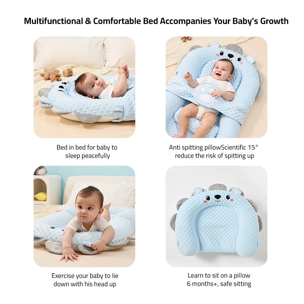 A Baby is Lying Down on the Comfortable Baby Nest Bed.