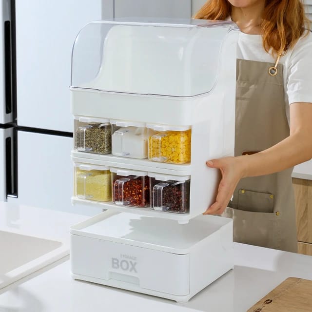 A lady holding the Countertop Kitchen Storage Rack