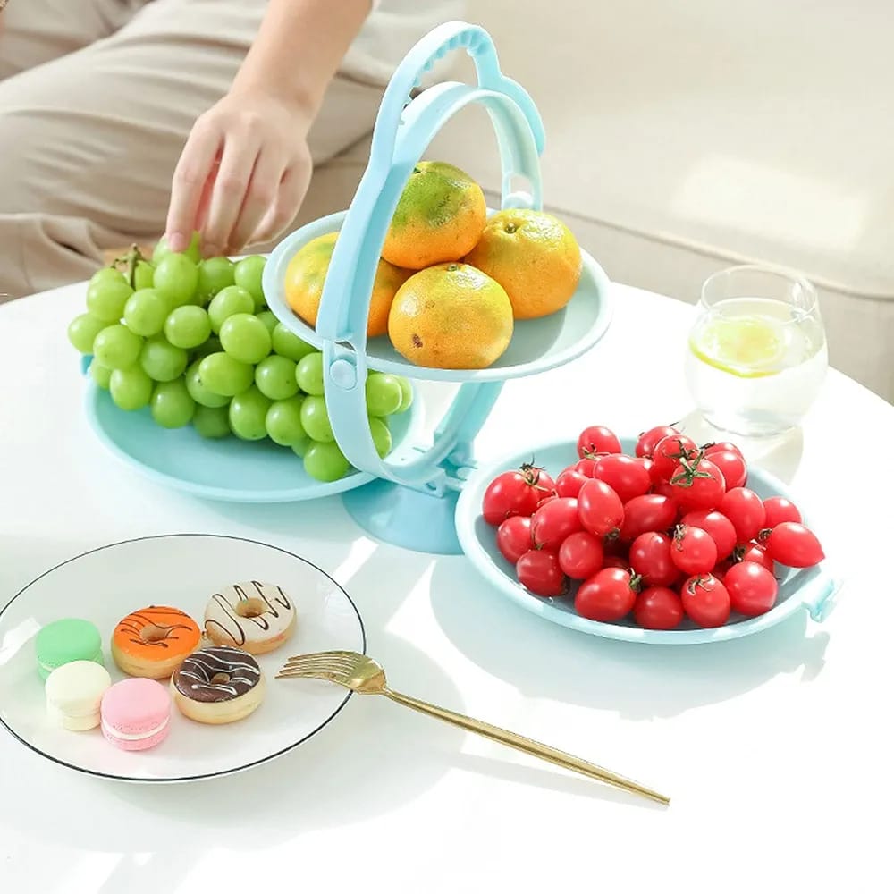 A Person Taking Fruits From a Creative Folding Fruit Plate.