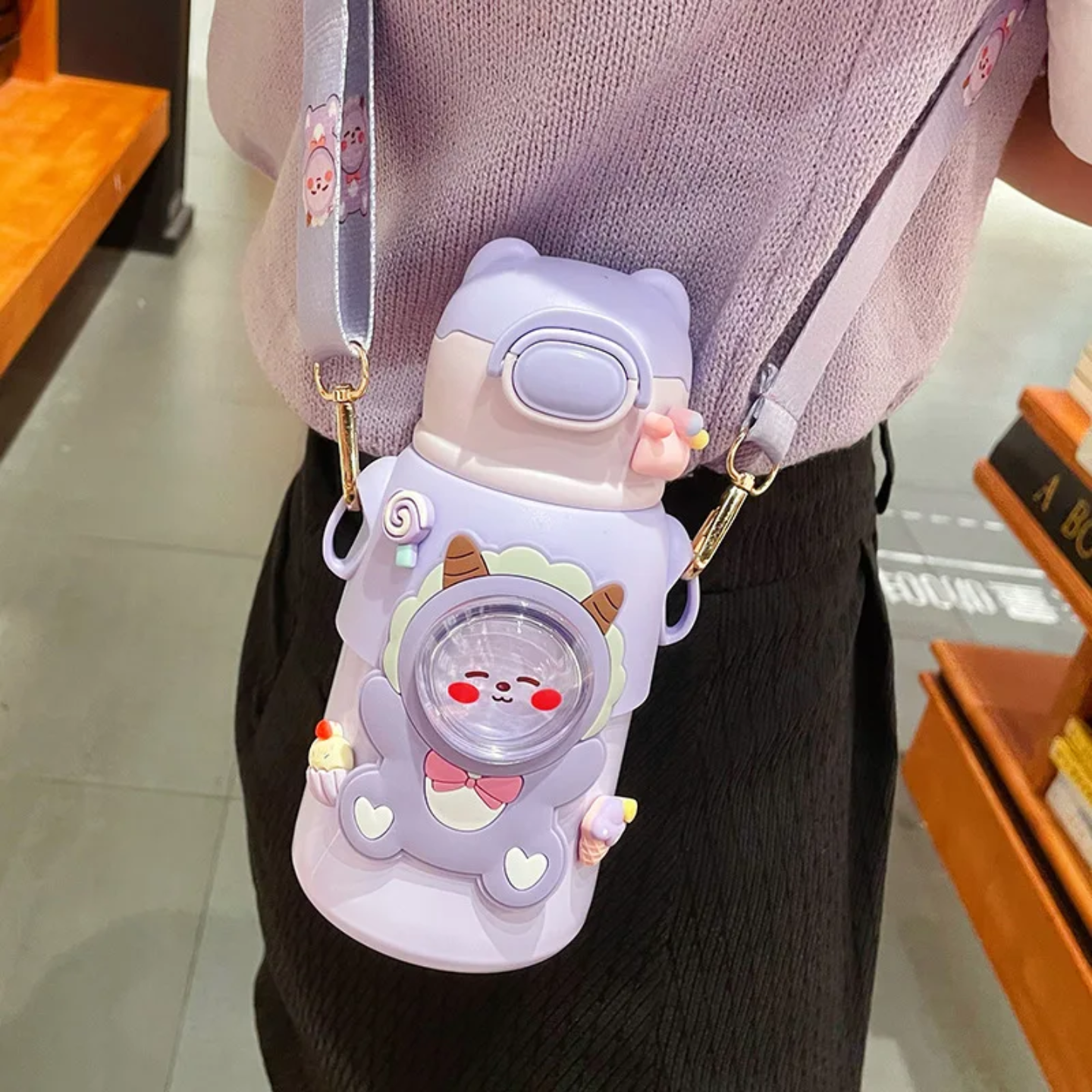 A Woman is Hanging Cute Cartoon Bear Water Bottle.