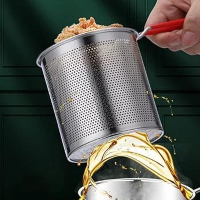 A Person is Frying Food Using Deep Frying Pot Strainer with Basket and Clip.
